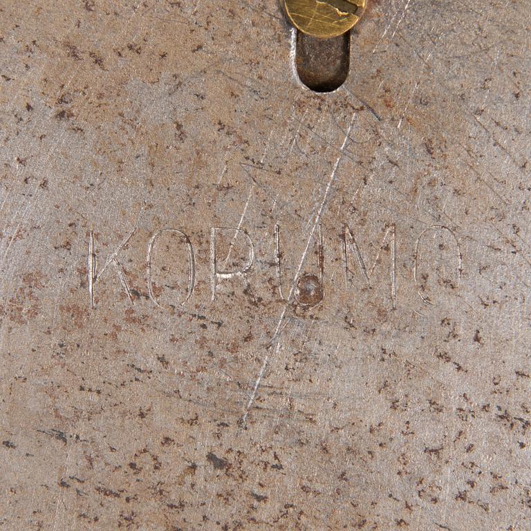 A mid-20th century wall light for Korumo.