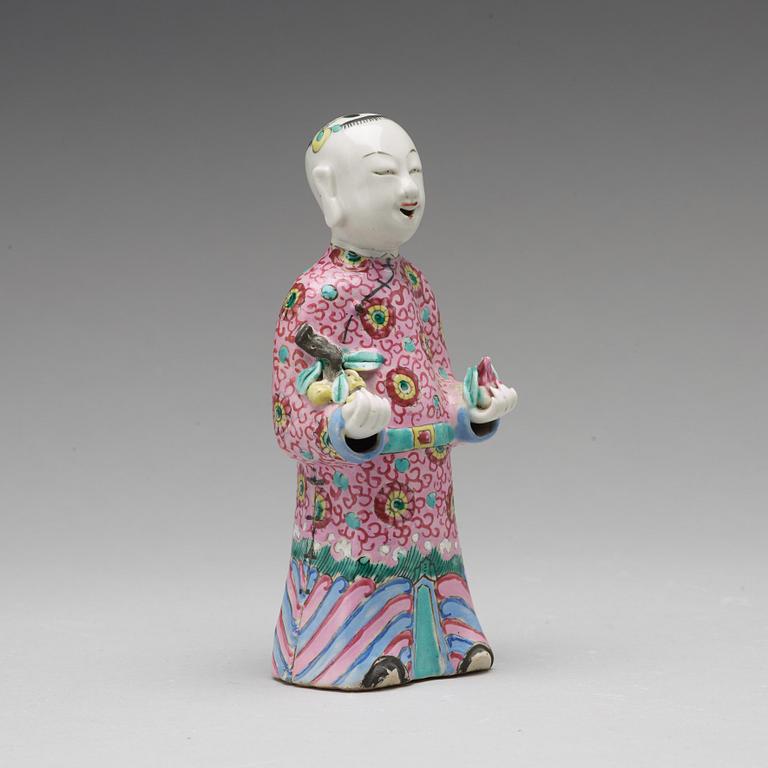 A famille rose figure of a laughing boy, Qing dynasty, circa 1800.