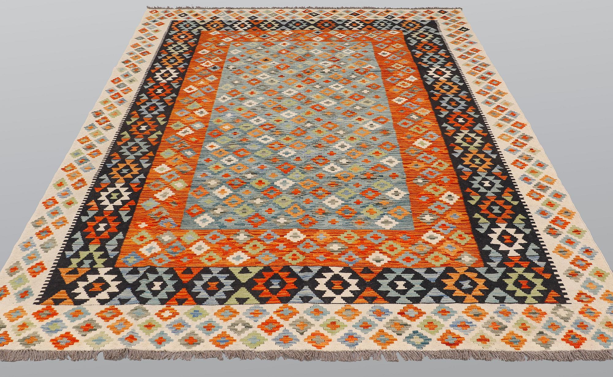 A carpet, kilim, ca 297 x 210 cm.
