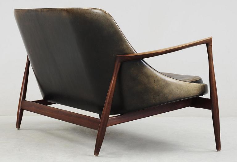An Ib Kofod Larsen 'Elisabeth' palisander and black leather sofa, Christensen & Larsen, Denmark 1950-60's.