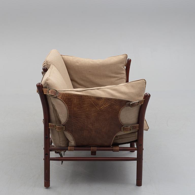 ARNE NORELL, an 'Ilona' stained wood and leather sofa fron Norell Möbel, Aneby, 1960's/70's.