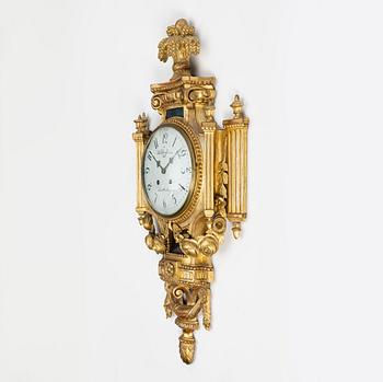 A Gustavian wall clock marked Daniel Herrström (active in Stockholm 1788-1790).