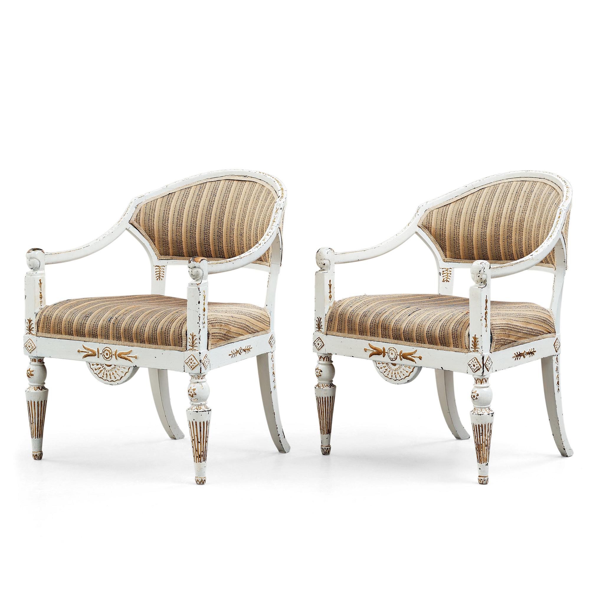 A pair of late Gustavian circa 1800 armchairs.