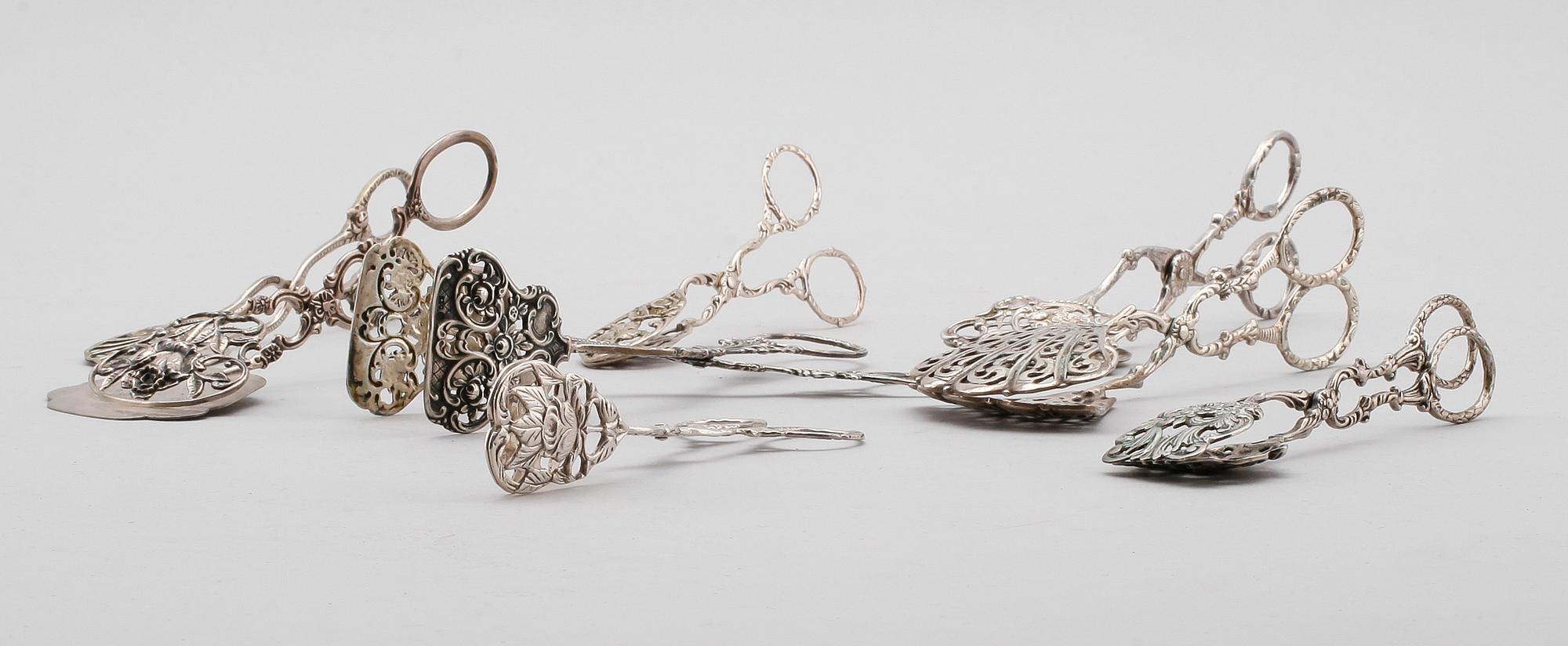 KAKTÄNGER, 8 st, silver, olika modeller, 1900-tal. Vikt ca 302 gram.