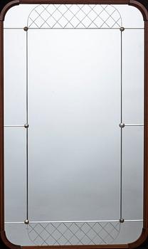 A mahogany mirror from Glas&Trä, Hovmantorp.