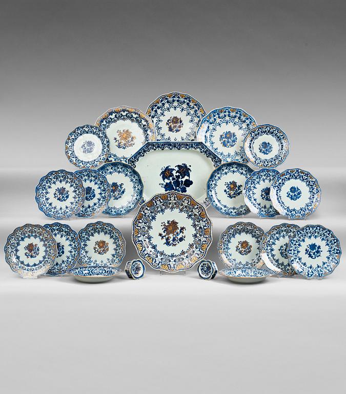 A blue and white dinner service, Qing dynasty, 18th Century. (76 pieces).