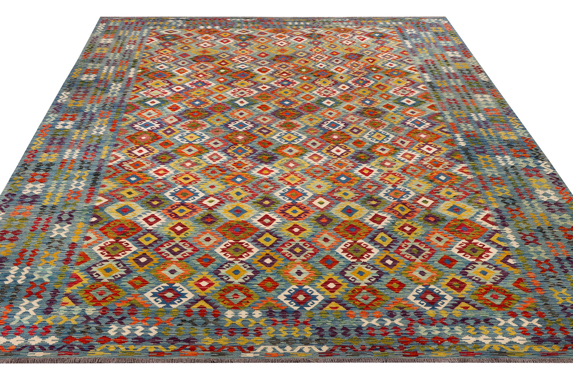 An Afghan kelim carpet, c. 397 x 308 cm.