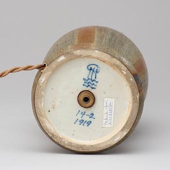 A Patrick Nordström stoneware table lamp with patinated brass mounts, Royal Copenhagen, Denmark 1919.
