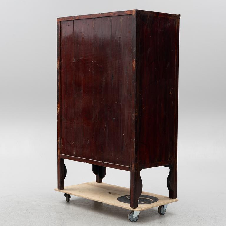 A 20th century cabinet, China.