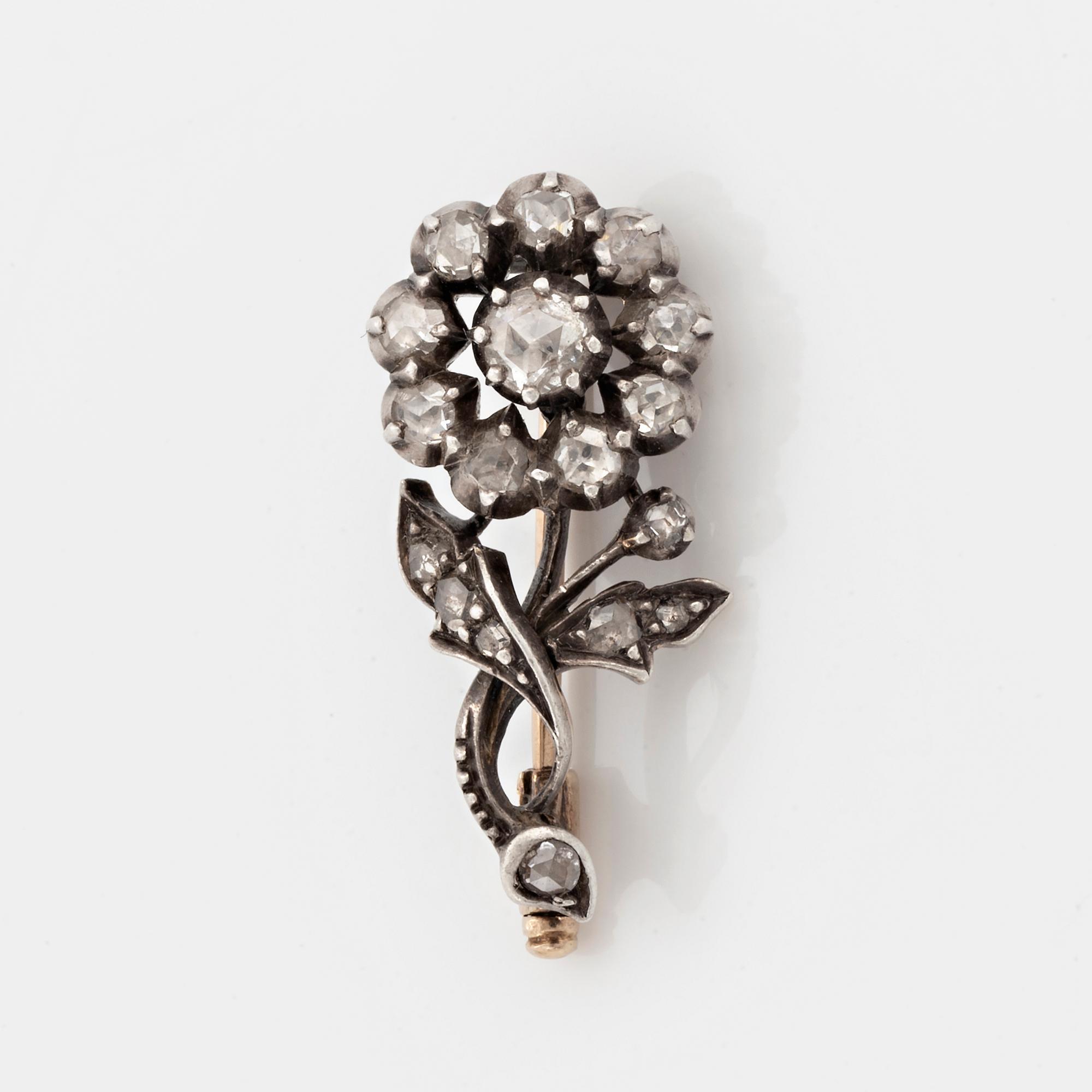 Rose-cut diamond flower brooch.