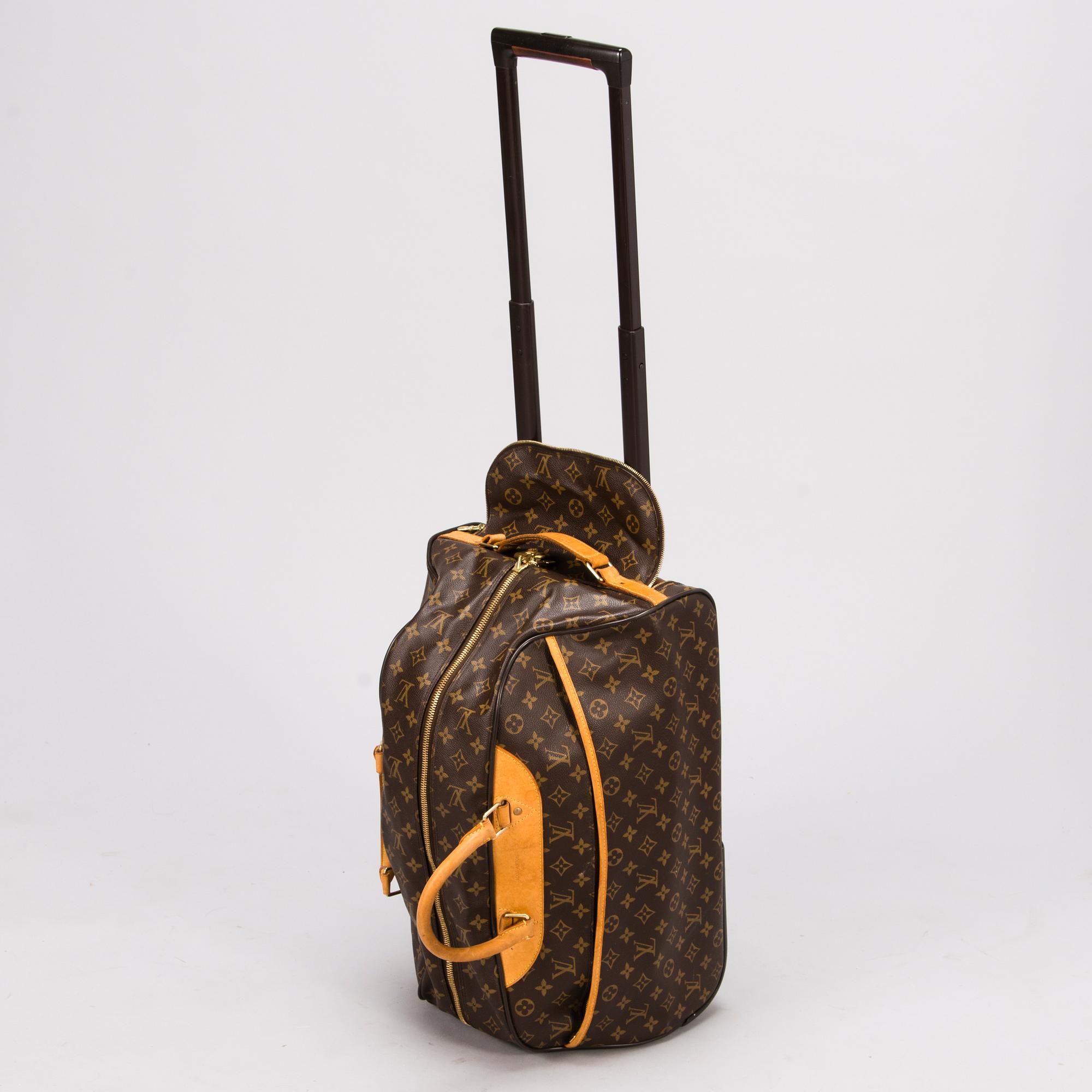 LOUIS VUITTON Monogram Canvas Eole 50 TRAVEL BAG.
