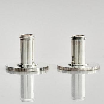 Georg Jensen, a pair of sterling silver candlesticks, design by Sigvard Bernadotte, model no 711A, Copenhagen, Denmark after 1945.