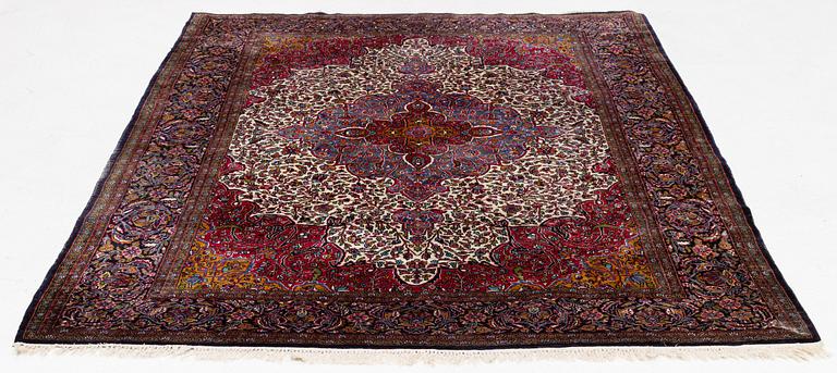 A carpet, oriental silk, approx. 269 x 184 cm.