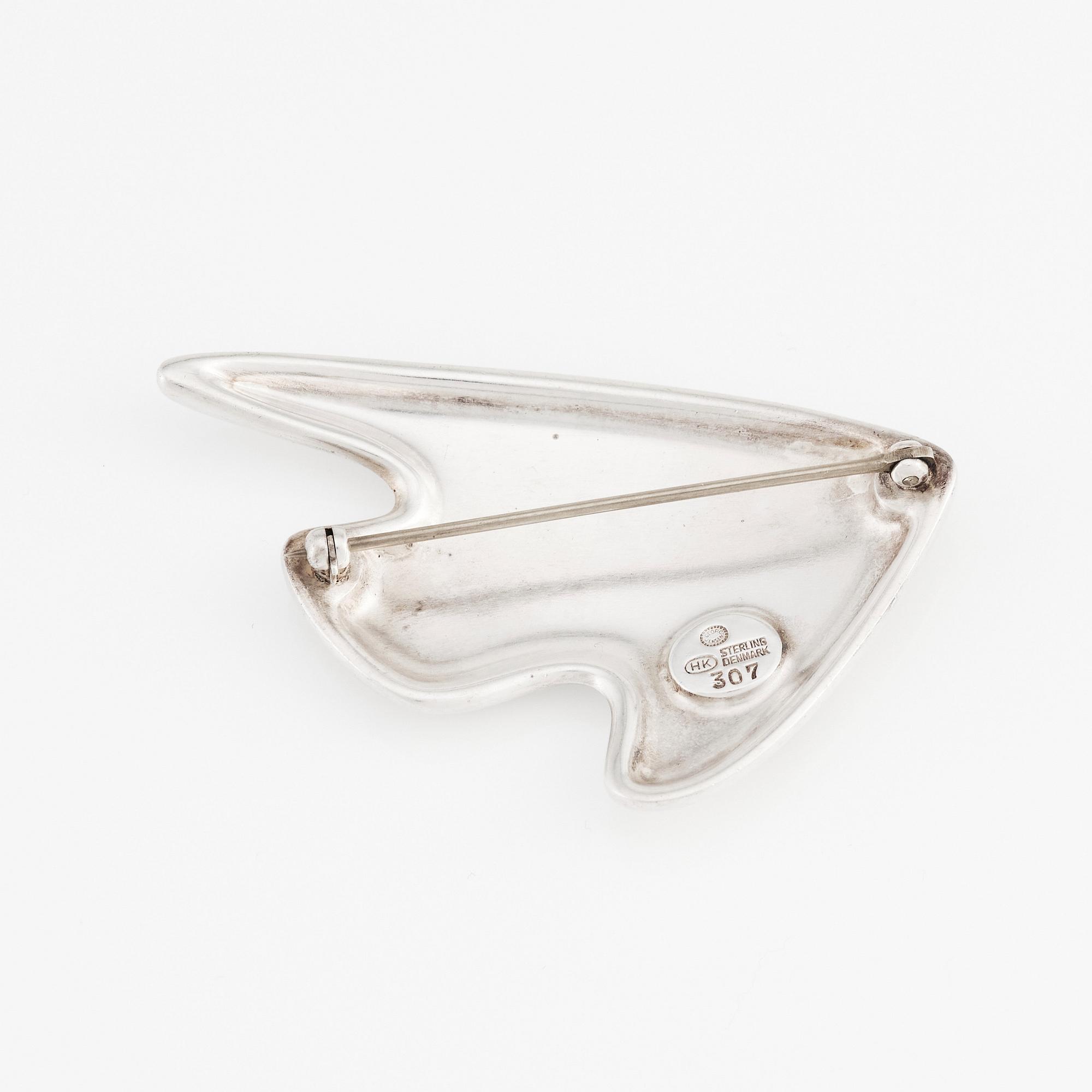 Henning Koppel, a sterling silver and dark brown enamel brooch, Georg Jensen, Copenhagen, Denmark, model 307.