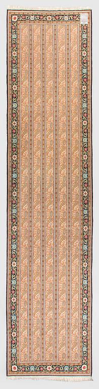 A runner, Ghom, silk. Approx. 100 x 425 cm.