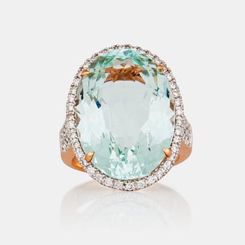 1267. A 20.70 ct aquamarine and 0.83 ct diamond ring.