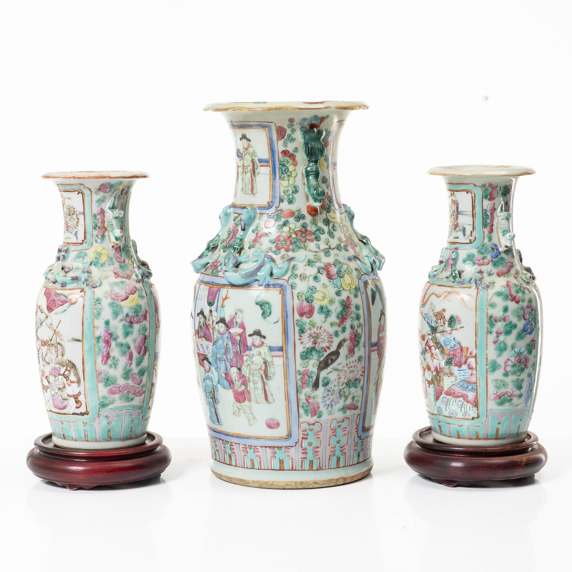 A group of three famille rose vases, Qing dynasty, late 19th century.