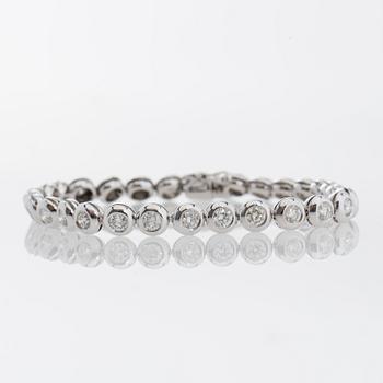 ARMBAND, 18K vitguld med briljantslipade diamanter ca 4.35 ct.