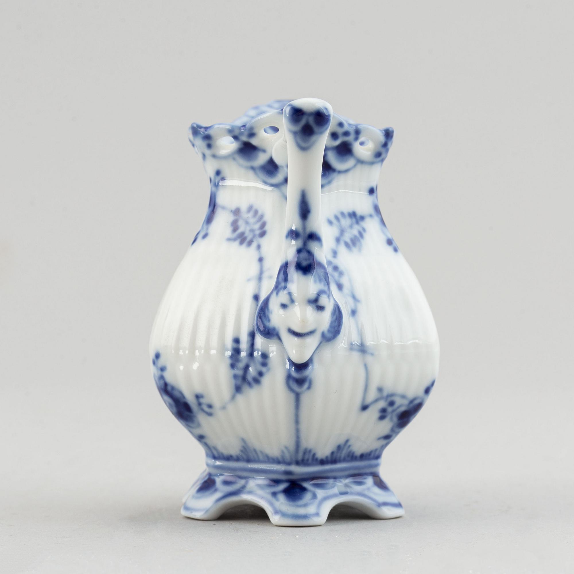 A three piece Royal Copenhagen "Blue Fluted" full lace coffee service.