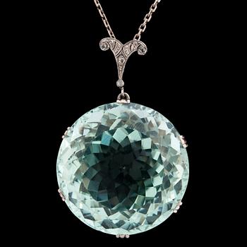 1060. A large faceted aquamarine and diamond pendant, c. 1930's.