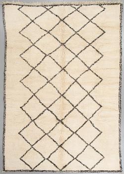 A moroccan rug, 330 x 222 cm.