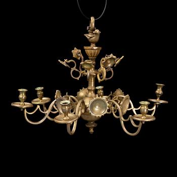 A Baroque and Baroque-style six-light chandelier.