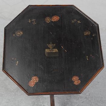 A painted folding table, 19th Century.