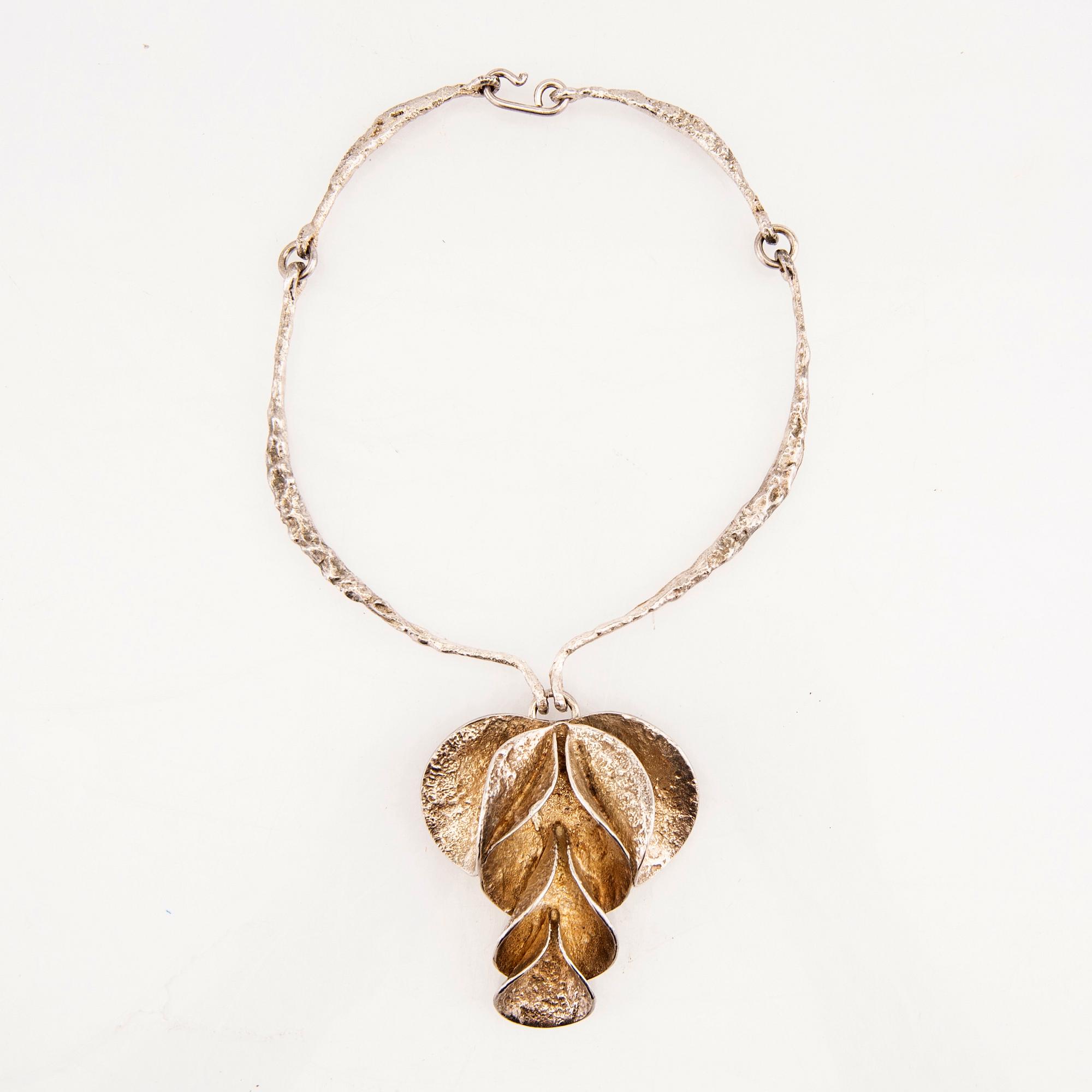 A silver necklace by Theresia Hvorslev for Mema 1978.