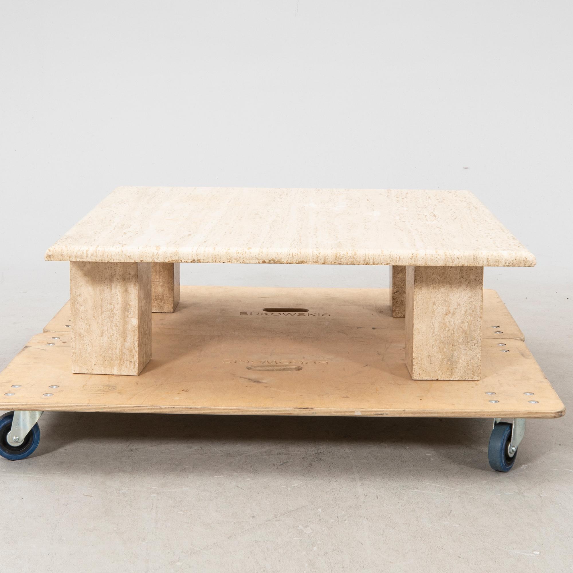 A late 20th century/21st century travertin coffee table.