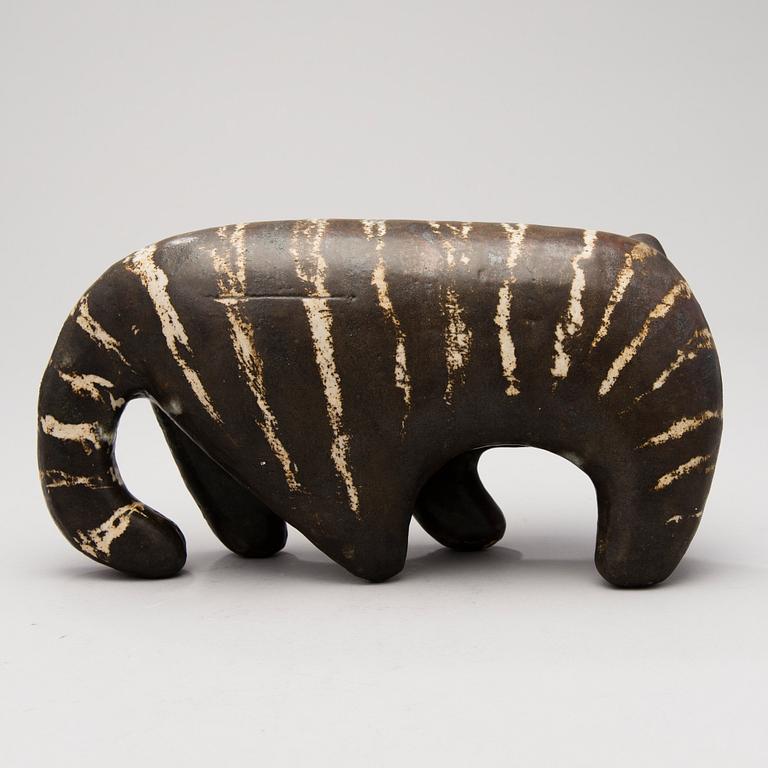 A Ceramic Figurine, signed T Kaasinen Arabia Finland.