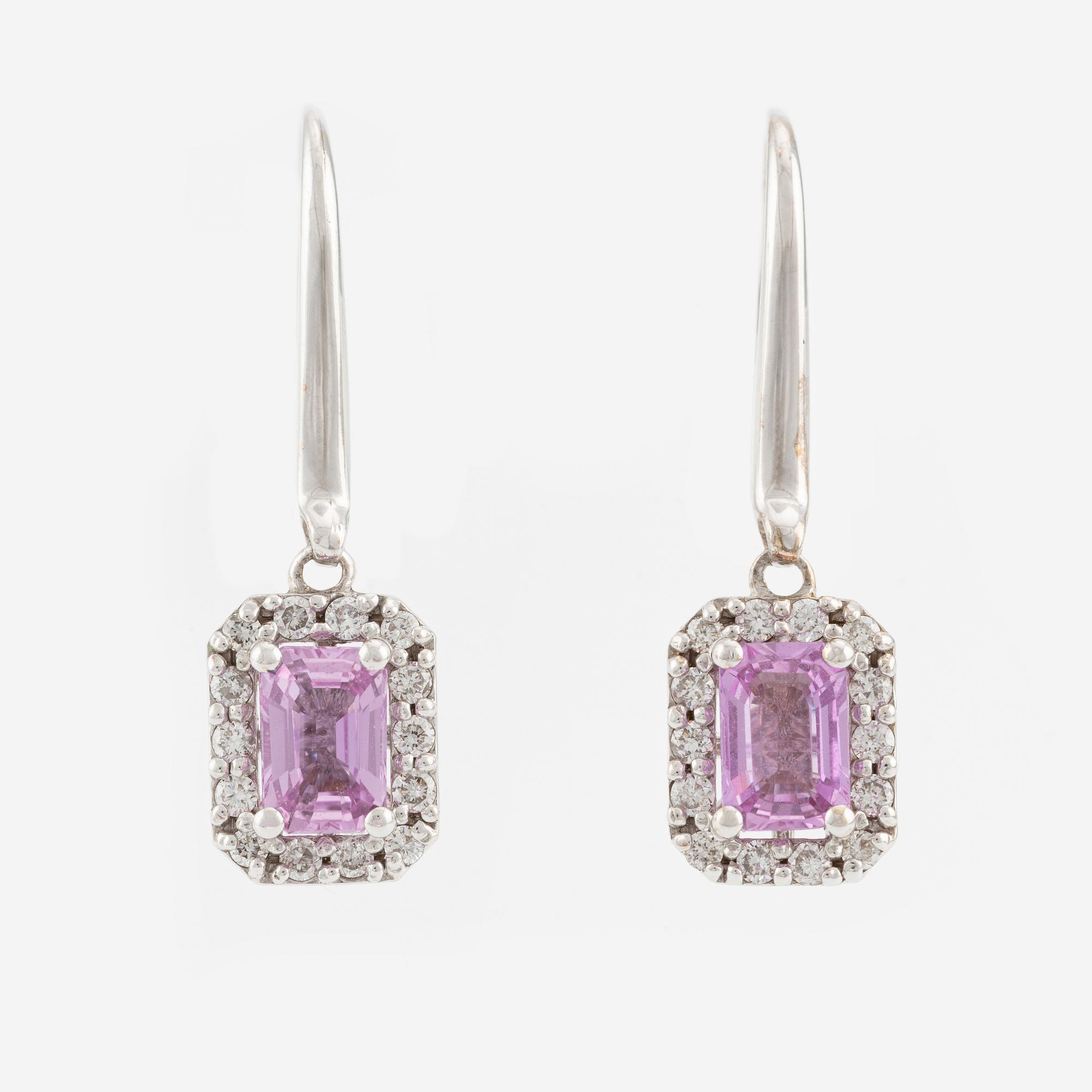 A pair of earrings in 18K white gold with pink sapphires and round brilliant-cut diamonds.