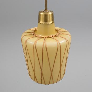 A Swedish vanilla coloured glass ceiling light with fretted rattan, 1930-40's.