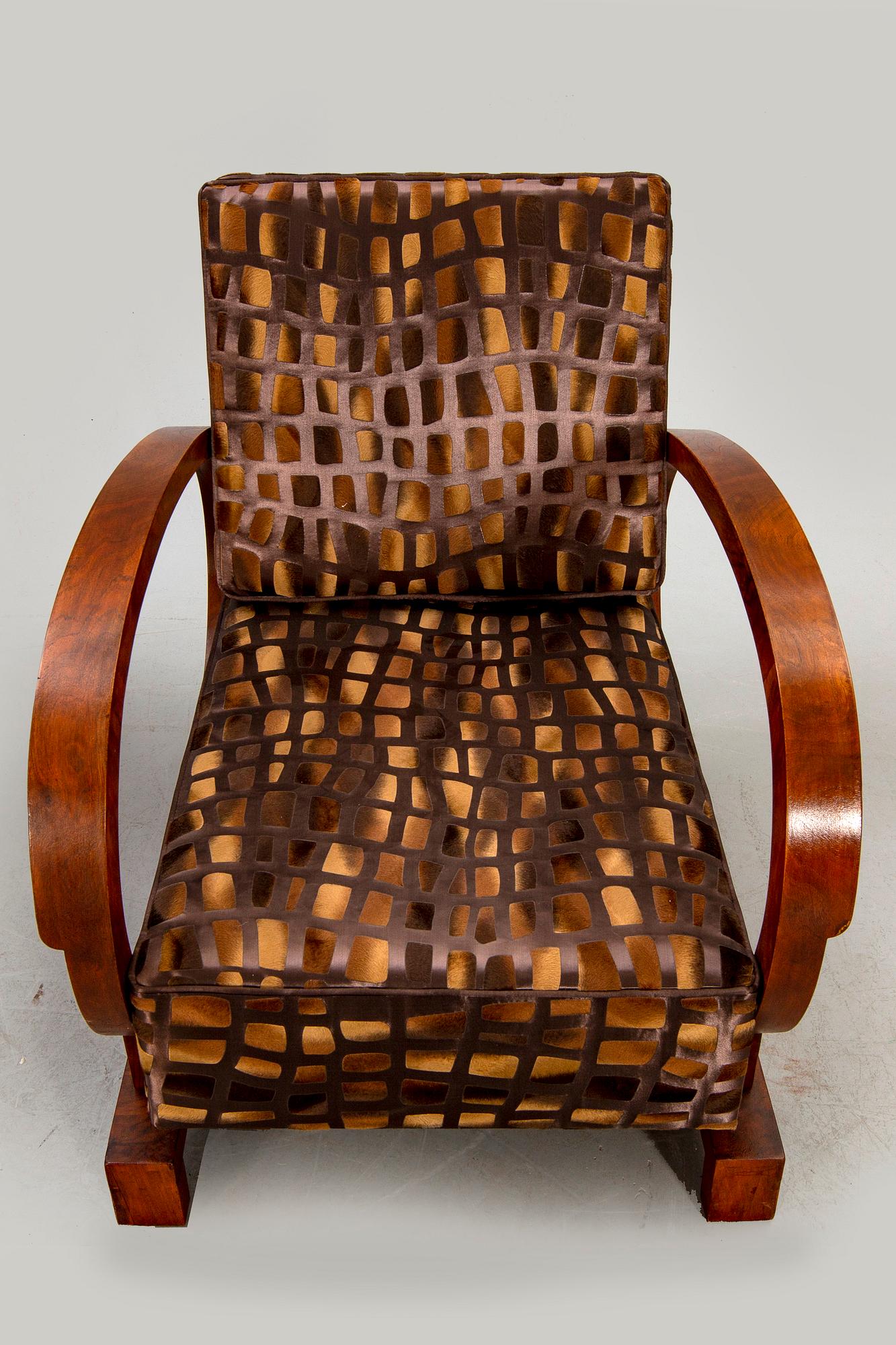 A pair of Art Deco easy chairs.