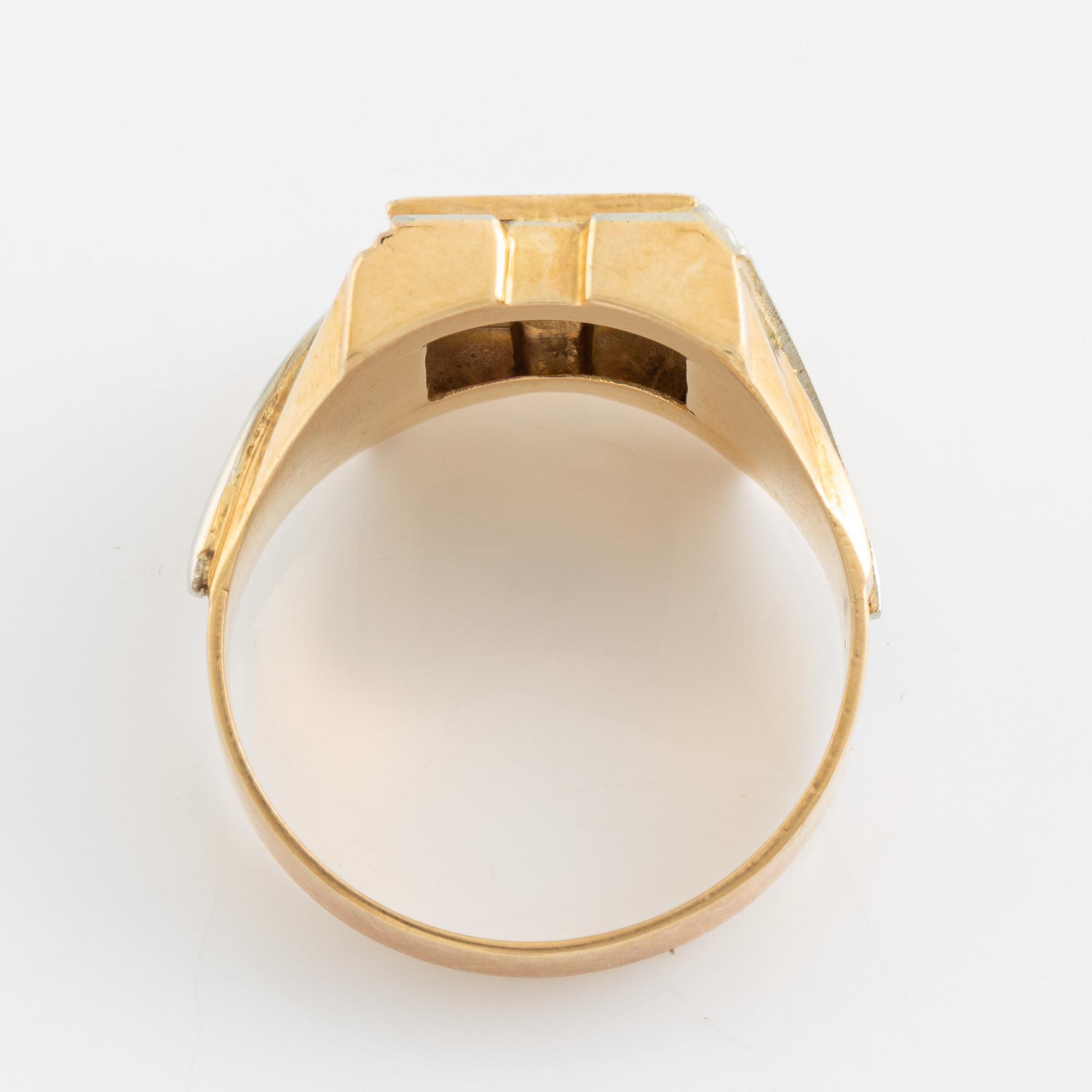 Ring 18K guld med en rosa sten.