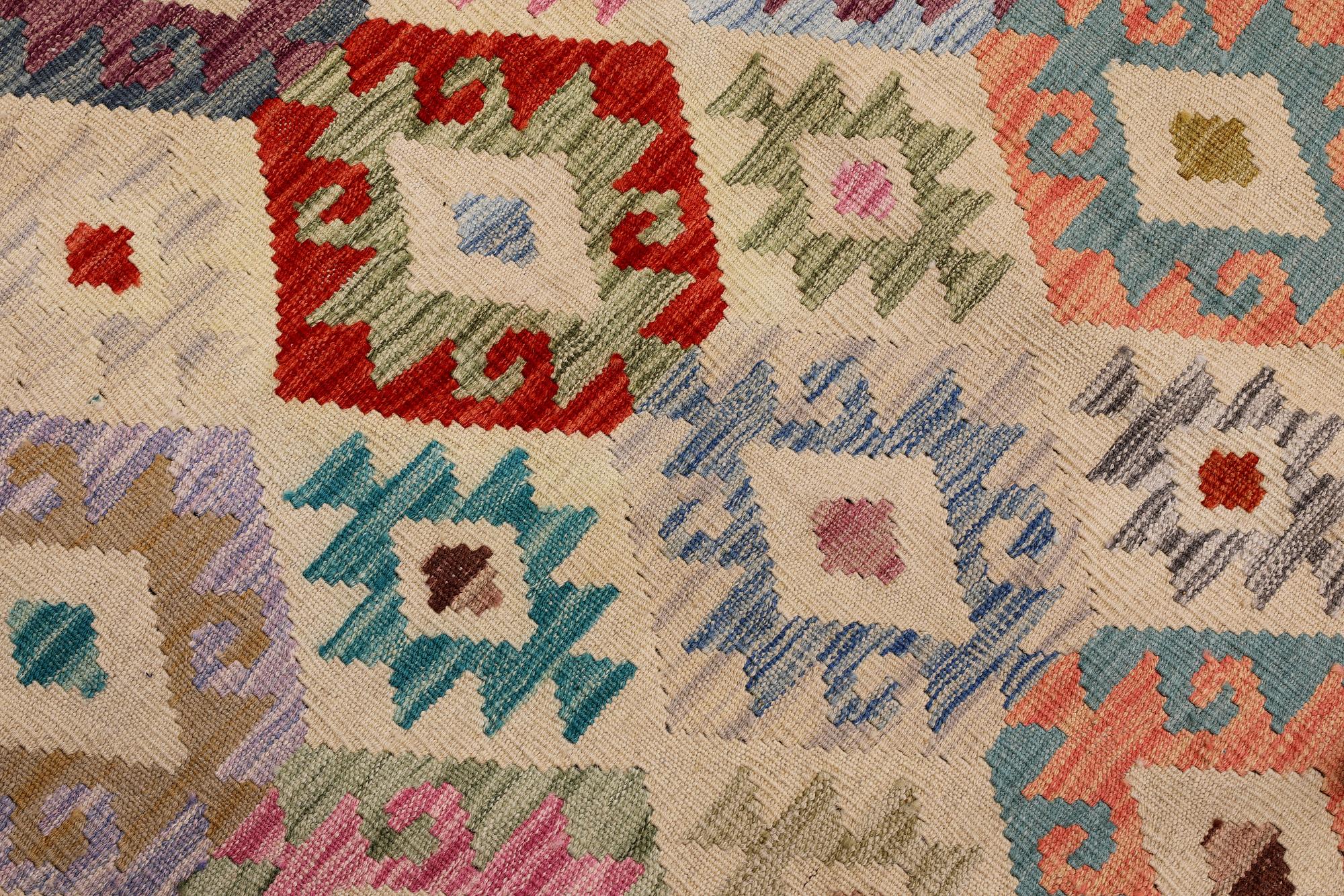 A Kilim rug, approx. 297 x 248 cm.