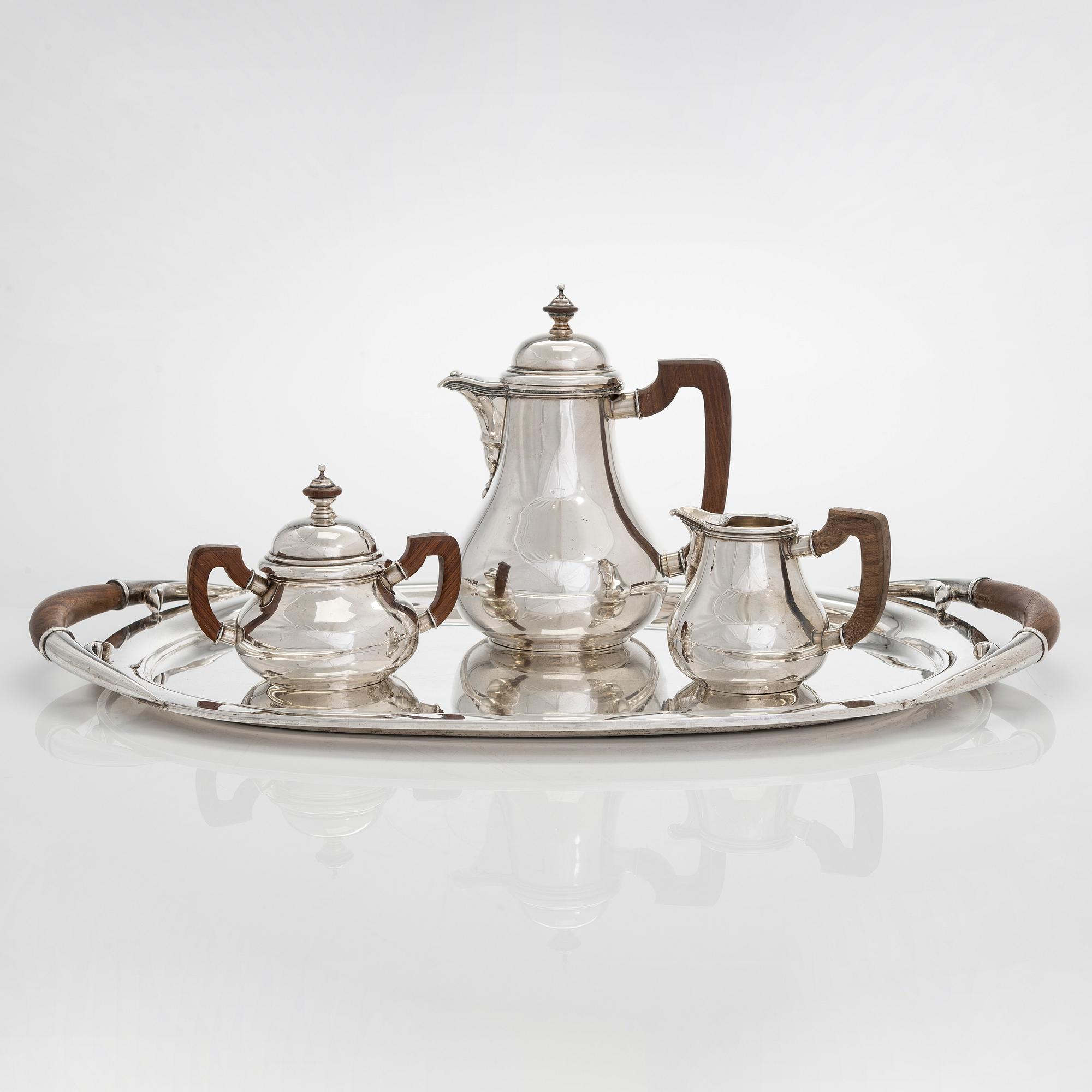 A 4-piece Mexican sterling silver tea set, mid-20th century.