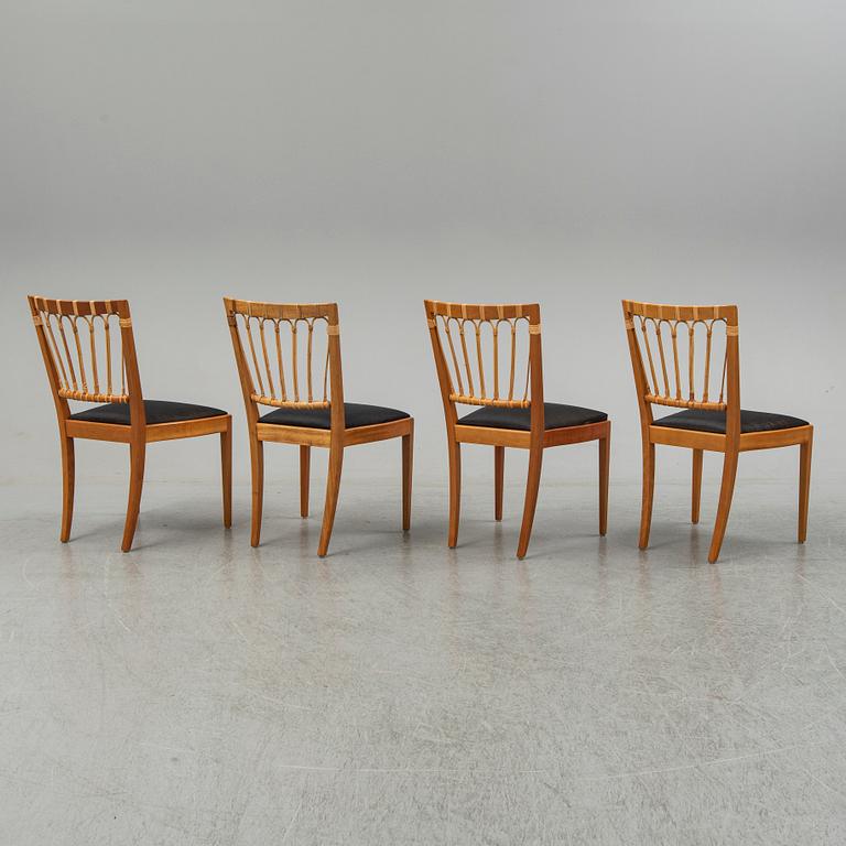 A set of four mahogany and rattan dining chairs, Josef Frank, , model 1165, Svenskt Tenn, Stockholm.