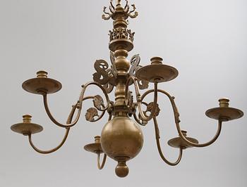 TAKKRONA, malm, 1900-talets första hälft. Höjd ca 80 cm.