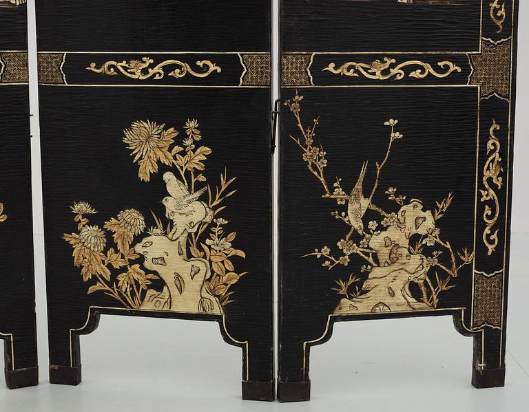 A six panel lacquer screen, Qing dynasty (1644-1911).