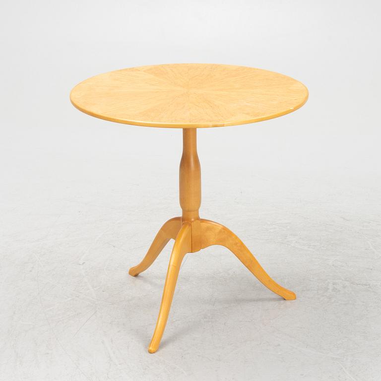 Carl Malmsten, a birch-veneered side table, Sweden, later part of the 20th century.
