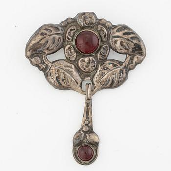 Brooch, Jugendstil, silver with red cabochon-cut stones.