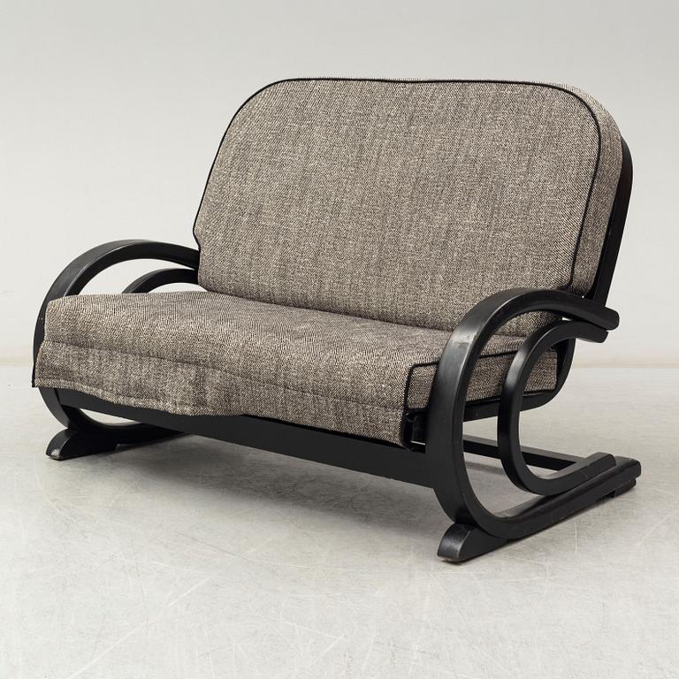 An 'Famulus' sofa and two easy chairs by JP Hully with RD number 809095 for 1936, by Gane Ltd.