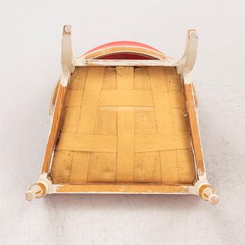 A pair of late Gustavian-style open armchairs, first part 19th century and circa 1900.