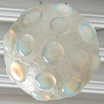 René Lalique, a 'Soleil' moulded opalescent glass ceiling light, France 1920-30s.