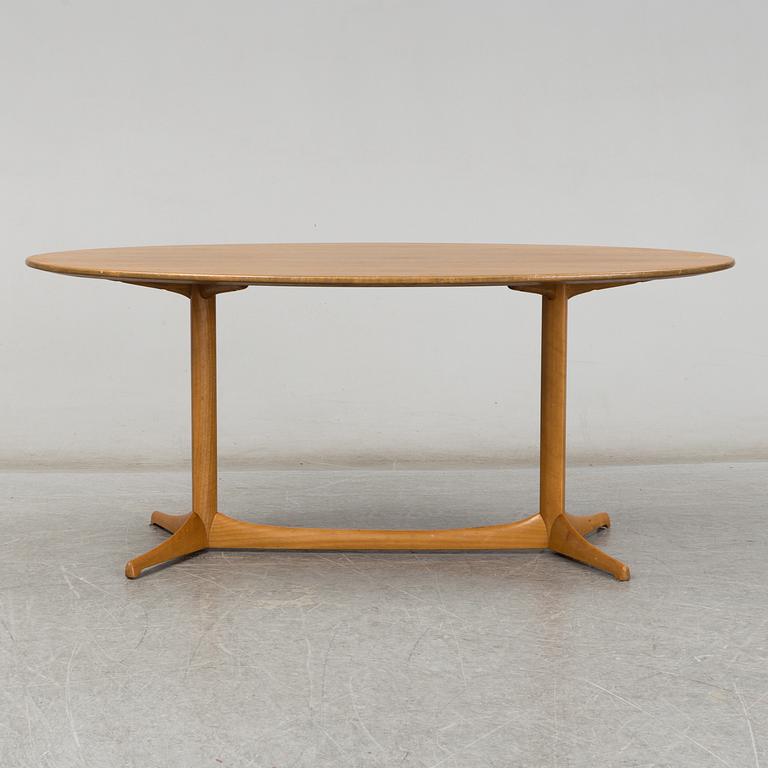 A 1959 'Plommonet' walnut coffee table by Kerstin Hörlin-Holmquist for Nordiska Kompaniet.
