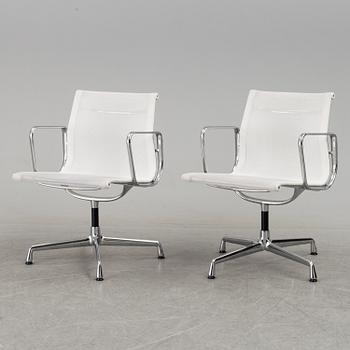 A pair of 'EA 108' desk chairs by Charles & Ray Eames for Vitra.