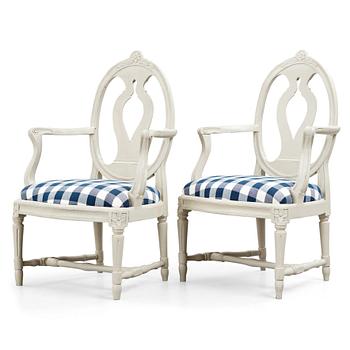 A pair of Gustavian late 18th century armchairs.