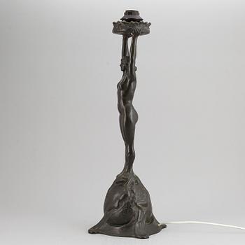 GERDA SPRINCHORN, an Art Nouveau green patinated bronze lamp "The Sun", Herman Bergman, Stockholm, early 20th century.