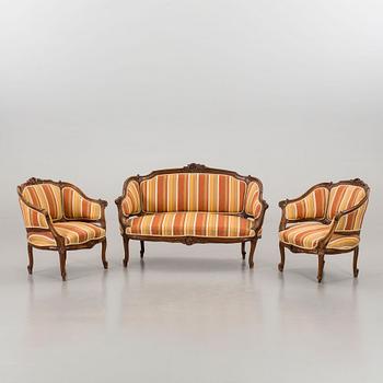 A SOFA AND A PAIR OF ARMCHAIRS, rococo style, end of 20th century.