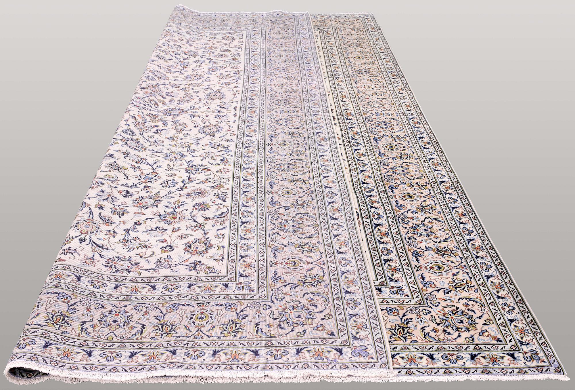 A carpet, Kashan, signed, ca 402 x 296 cm.